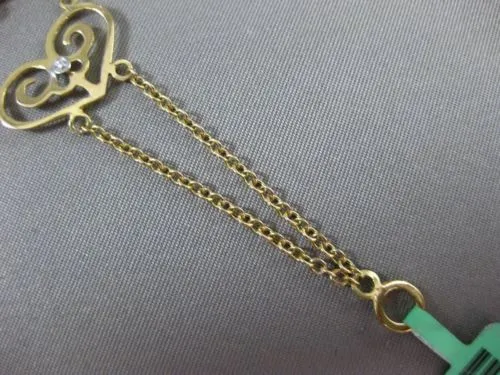 ESTATE EXTRA LARGE .33CT DIAMOND 18KT WHITE & YELLOW GOLD FLEUR DE LIS BRACELET