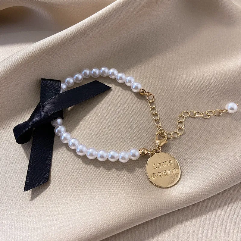 Pearl Beaded with Black Bow & Letter Bracelet