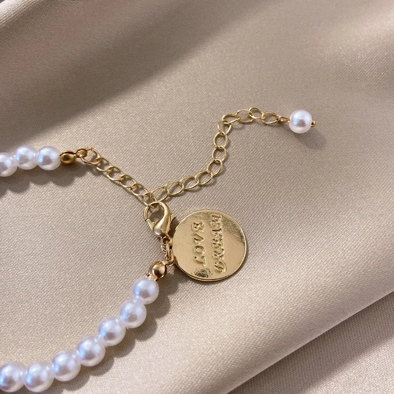 Pearl Beaded with Black Bow & Letter Bracelet