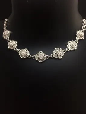 Pin wheel Choker