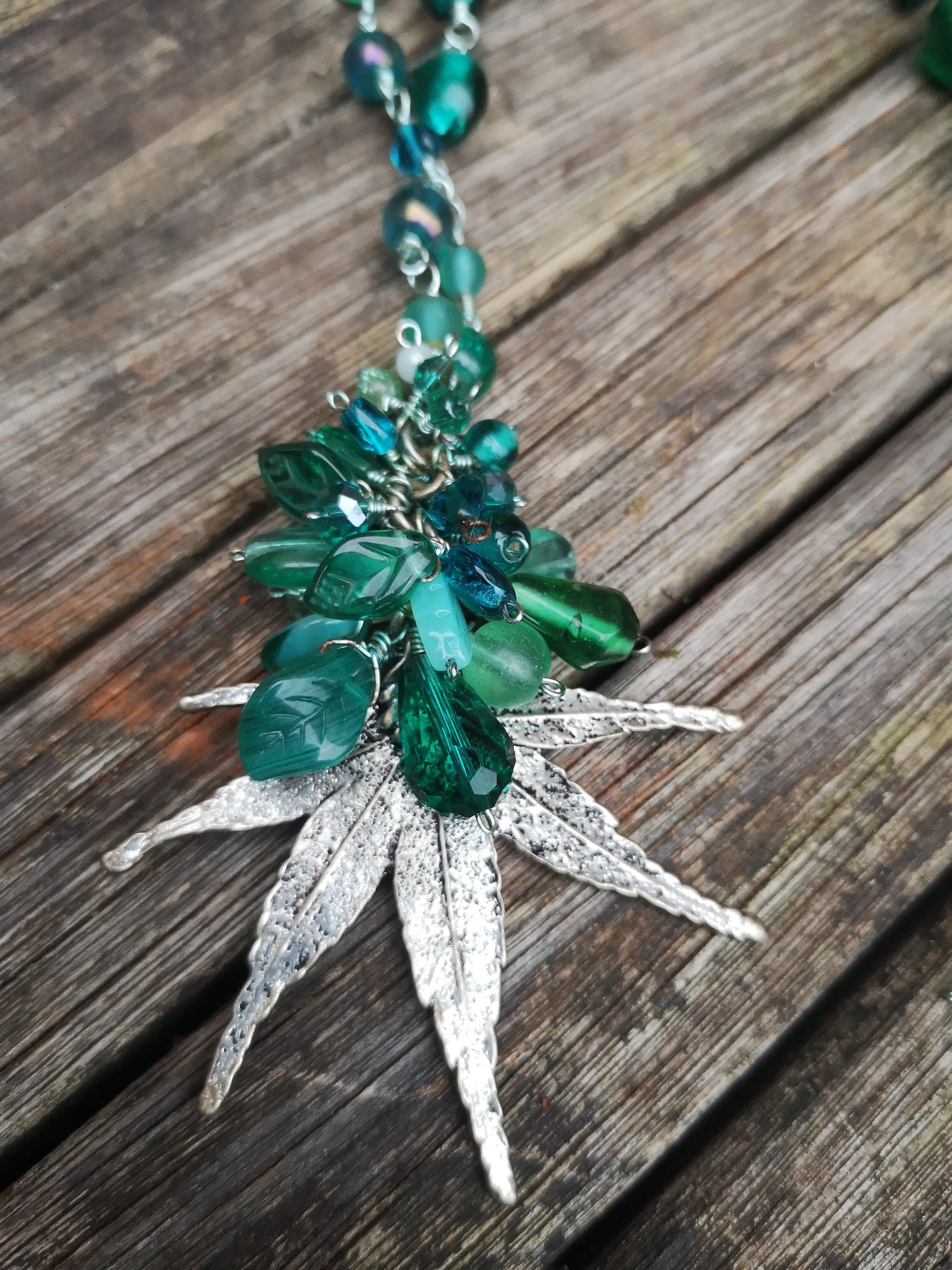 "Hemp", long line beaded necklace, with silver plated flat leaf design,